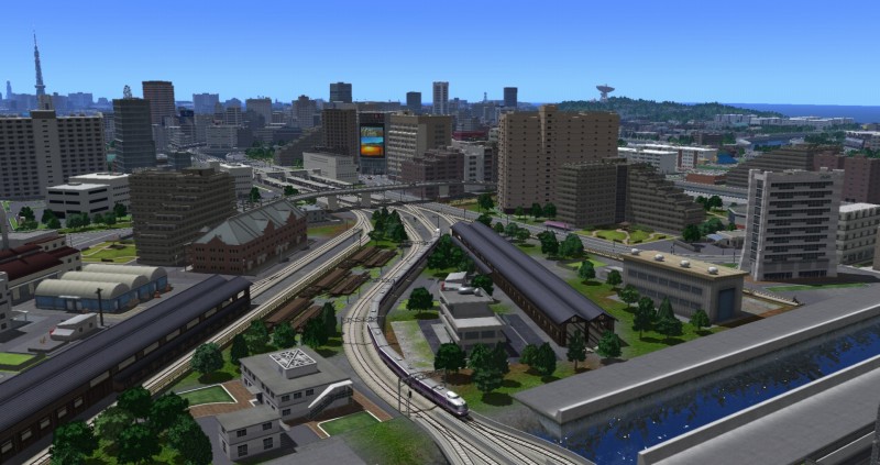 扇状に広がって配置される高師走検車区の間を通過